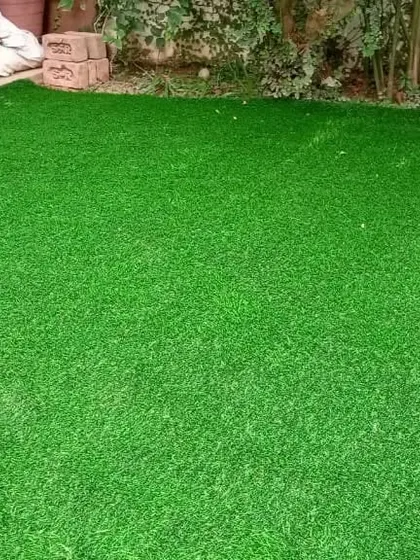 A lush, green artificial lawn that looks and feels like the real thing, but requires none of the upkeep.