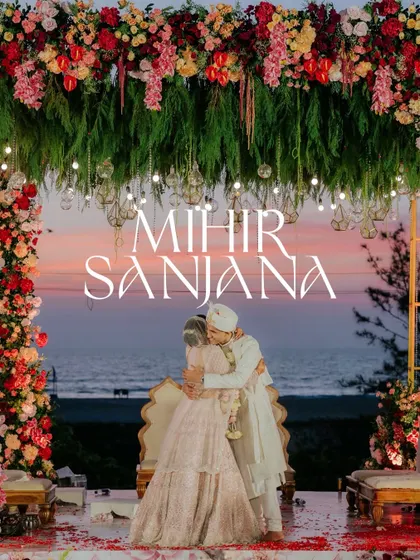A perfect end to a perfect day. I always look for these magical moments, like this embrace under a stunning floral mandap as the sun sets over the sea in Goa. This is the essence of destination wedding photography.