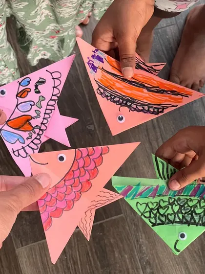 A school of colorful paper fish. This simple origami project is perfect for younger kids and can be decorated in endless ways.