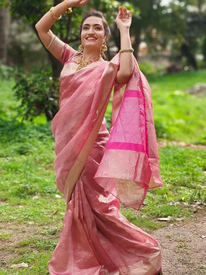 A final, joyful shot of Vaishnavi in the pink saree. It was a pleasure creating this blouse to complete her beautiful look.