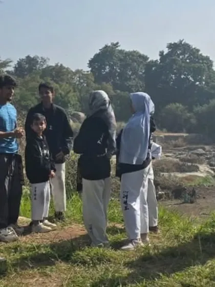 A moment of instruction and discussion during our Lal Bagh training session.