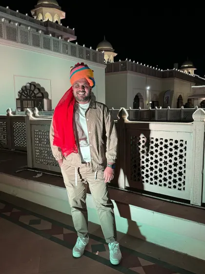 Embracing the local culture with a traditional Rajasthani pagdi during a destination wedding in Jodhpur. I love being a part of the whole wedding experience.