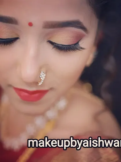 A detailed look at this soft and beautiful bridal eye makeup. The blend of neutral eyeshadows and a sharp eyeliner wing creates a look that is both elegant and timeless.