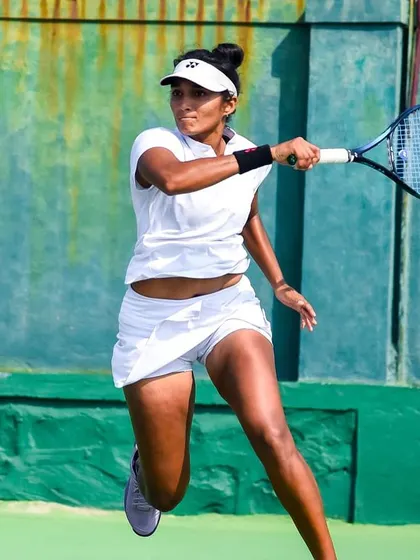 In action during the final of the ITF W25 Solapur. These photos show different aspects of my game under pressure, from hitting a running forehand to maintaining balance on a two-handed backhand.