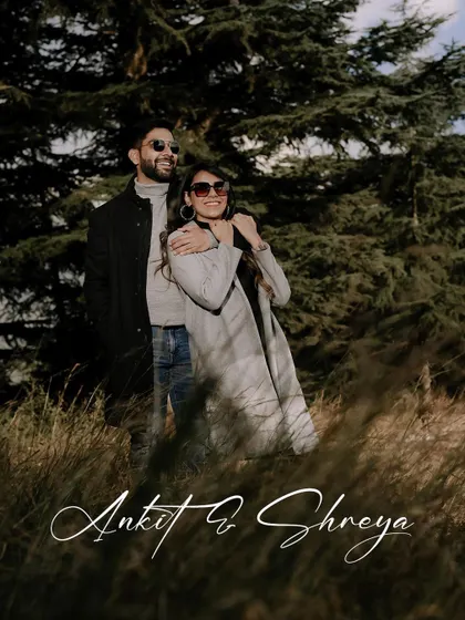 A happy, candid moment between Ankit and Shreya, surrounded by the natural beauty of the pine forests.