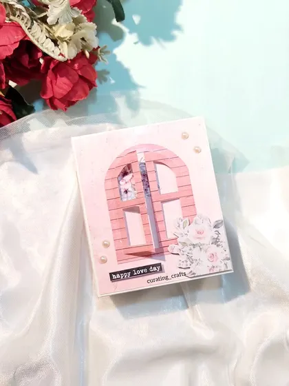 The cover of the window-themed vintage mini scrapbook.