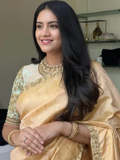 A beautiful, candid-style portrait. The soft, natural makeup looks effortless and chic, a style that is highly requested by clients.