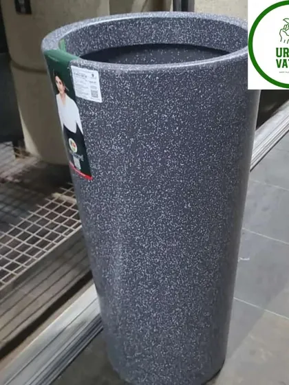 A tall, round fiber pot with a stone finish.