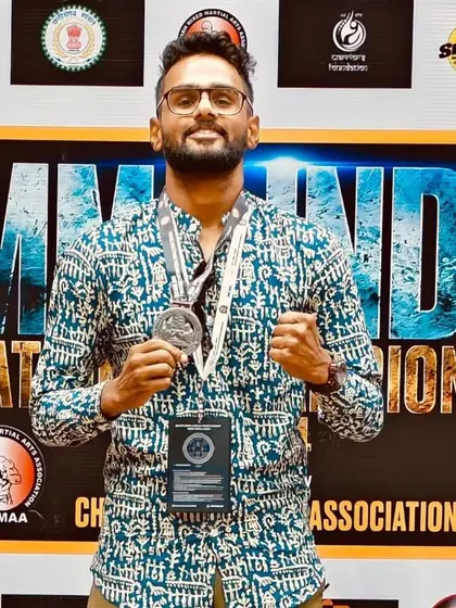Meet Suraj, our Silver medalist in the Men's Bantamweight division. An IT project manager by profession, he proves that passion and dedication have no age limit.