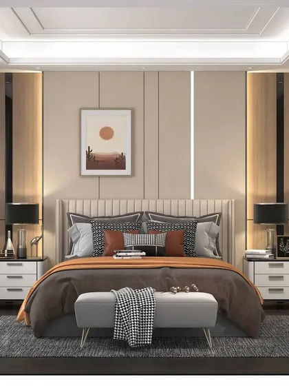 A warm and inviting bedroom design using a palette of beige, orange, and dark wood. The wall behind the bed features simple paneling and a minimalist art print.