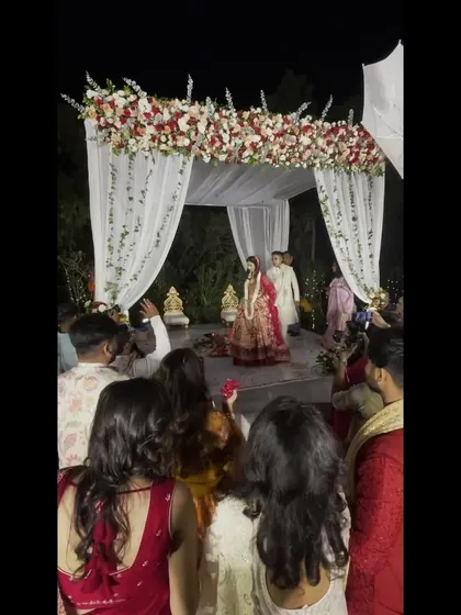 The guests' view of a beautiful nighttime Varmala ceremony. It's a core part of the wedding that I am honored to host.