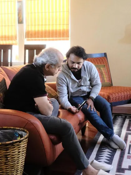 Here, my Guruji, Pt. Yogesh Samsi ji, shares a piece of music with me on his phone. Technology changes, but the tradition of a Guru sharing knowledge with his shishya remains eternal.