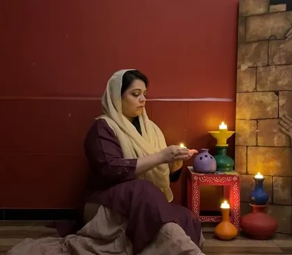 A moment of quiet contemplation during my performance for 'woman ki baat'. The simple act of lighting a lamp can be a powerful theatrical gesture.