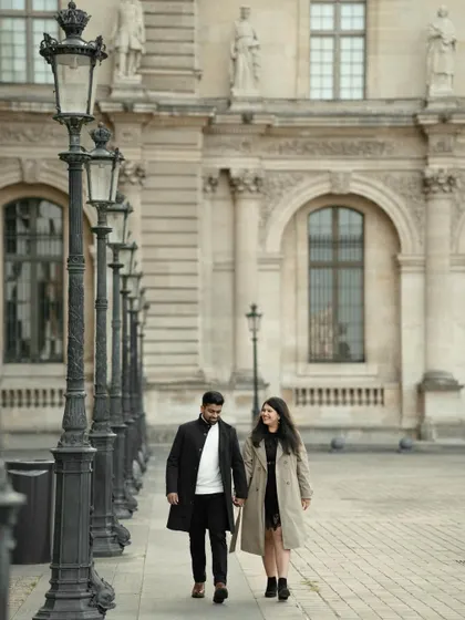 A candid moment of Varun and Aishwarya strolling through the historic streets of Paris. We capture the joy of exploring a new city together, hand in hand.