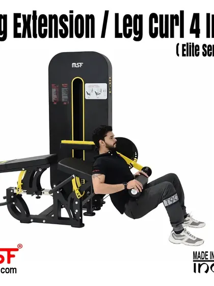 A user performs a seated hamstring curl on the versatile 4-in-1 machine.