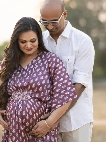 Another cherished photo from our maternity shoot, capturing the quiet moments of connection with my baby before she arrived.