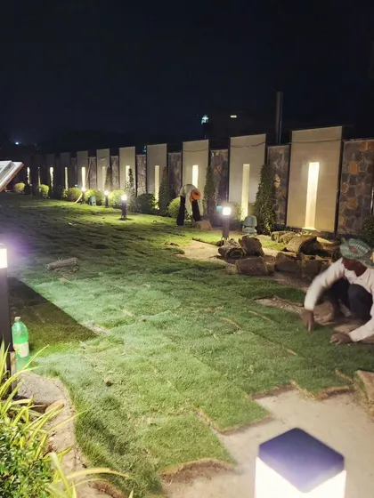 Our skilled team works carefully, even after dark, to ensure every piece of turf is perfectly placed for a seamless, professional finish.