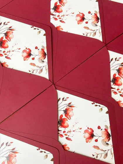 A closer look at the details from this beautiful wedding suite. The design included multiple inserts with event details, custom floral envelope liners, and a personalized wax seal with the couple's initials.