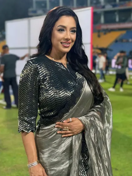 Rupali Ganguly looking elegant in a metallic grey saree with a sequined blouse.
