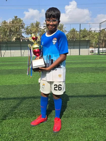 Another U12 champion with his well-earned trophy after the Goa tournament.