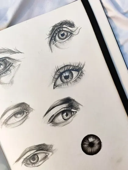 An entire page dedicated to practicing eyes. I sketch them in different styles, from realistic to stylized, to improve my ability to capture expression.