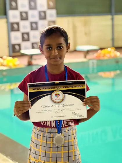 We are incredibly proud of our young champion, Ms. Tanmayee, for winning a silver medal in freestyle. Her success is a testament to her hard work and the quality of our competitive training.