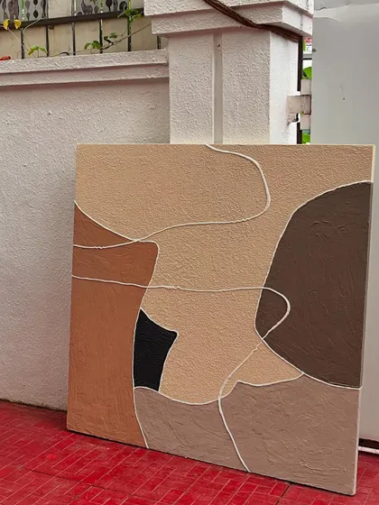 The abstract canvas piece displayed, ready to be hung. This type of smaller, portable work is great for adding a touch of custom art to any room.