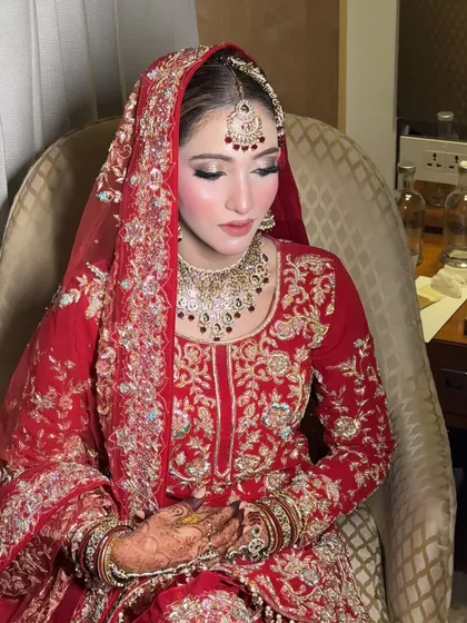 A portrait of Dr. Rehnnuma, showcasing her soft glam Nikkah makeup. The look features a flawless base, subtle smokey eyes, and beautiful contouring.