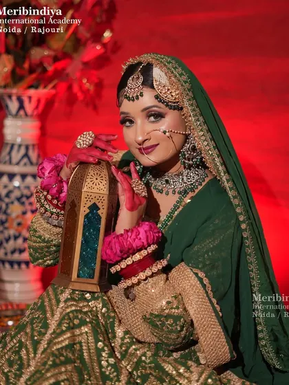 A stunning Muslim bridal look featuring a side 'passa' or 'jhoomar' and a 'maang tikka' set against a voluminous hairstyle.