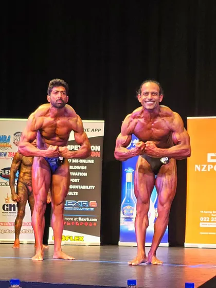 A most muscular pose on stage at the INBA Pacific Rim championships. This is the result of dedicated natural training.