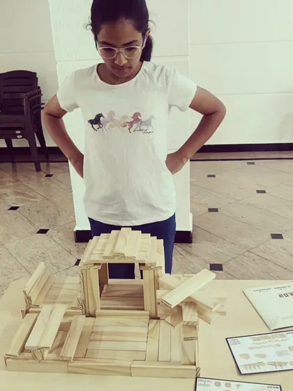 The focus in the room is always so real and inspiring. Each child gets their own set of planks and a space to bring their ideas to life, learning about balance and dedication through hands-on building.