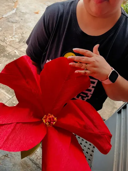 I love getting the details just right. Here you can see the intricate center of the paper hibiscus, crafted to look just like the real flower. It's this attention to detail that we bring to all our handmade decor.