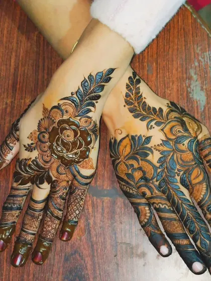 Two hands together, showcasing a complementary floral design. The shading gives the flowers a 3D effect.