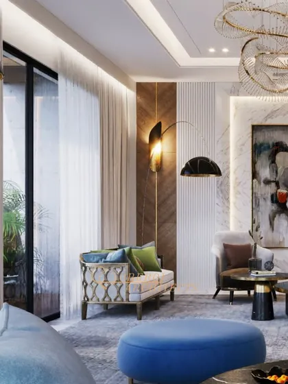 A living room designed with a vibrant color palette, featuring bold blue and green furniture against a backdrop of marble and wood. The sculptural chandelier adds an artistic touch.