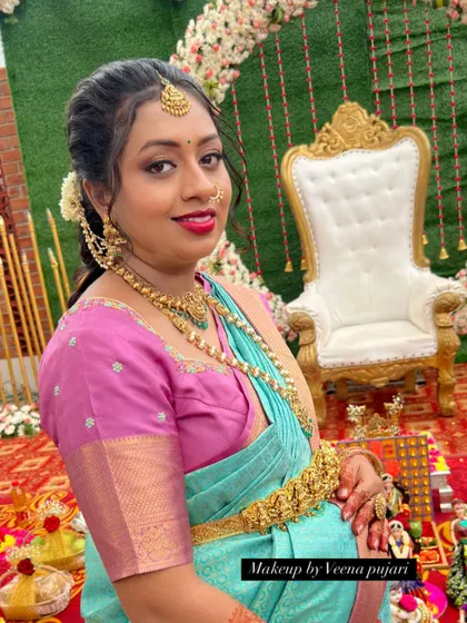 The lovely Jayasudha, looking like a queen at her baby shower. Her happy and relaxed demeanor says it all.