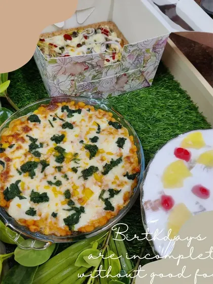 Birthdays are incomplete without good food. This birthday hamper includes a savoury Mushroom Quiche, a comforting vegetable Lasagna, and a sweet Pineapple Pudding.
