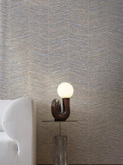 Gracefully sloping bamboo forms a bold herringbone pattern in this design from Jannelli & Volpi. The vertical grooves and geometric elegance infuse the surface with depth, rhythm, and vitality.