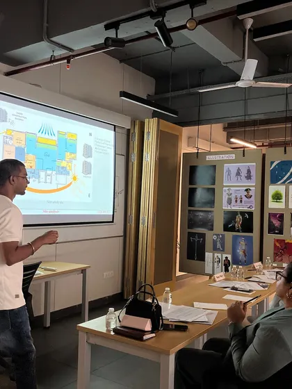 Shilpi and other jury members listen as a student presents his design concept, which includes a site plan focused on natural light and airflow. We believe in nurturing the next generation of designers.