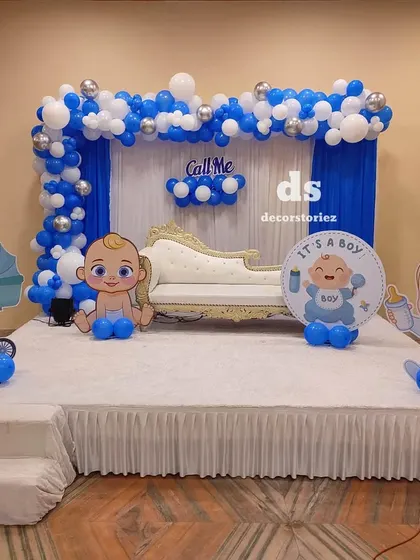 The same Baptism stage setup with a sofa for seating, perfect for photos with family and friends during the ceremony.