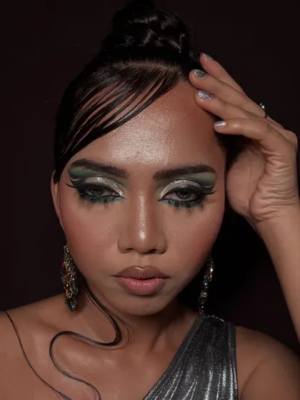 A full view of the avant-garde styling, where the makeup, hair, and expression come together to tell a story.