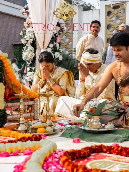 The couple seeks blessings during their wedding puja. I coordinate with priests and families to ensure all rituals are performed smoothly and beautifully.