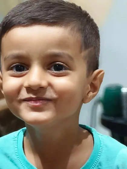 The cutest haircut for the cutest little guy. His happy smile is our favorite part.