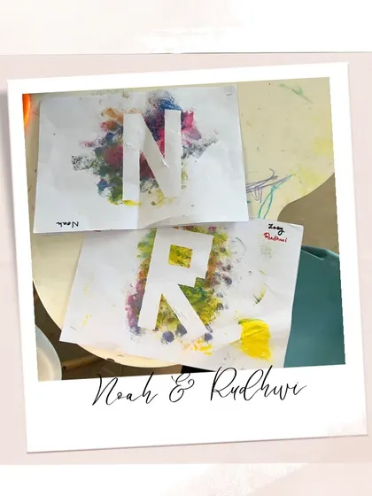 Creating beautiful name art with our youngest students, Noah and Rudhuvi. This is a wonderful way to help them recognize letters while having creative fun.