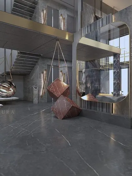 This view highlights the architectural elements of a multi-level home, including the floating staircase and mezzanine. We use art, like the suspended geometric cubes, to activate these transitional spaces and turn them into design features.