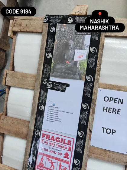 The final packed crate for the large Buddha fountain, clearly marked with "Open Here" and "Top" to ensure correct handling upon arrival.
