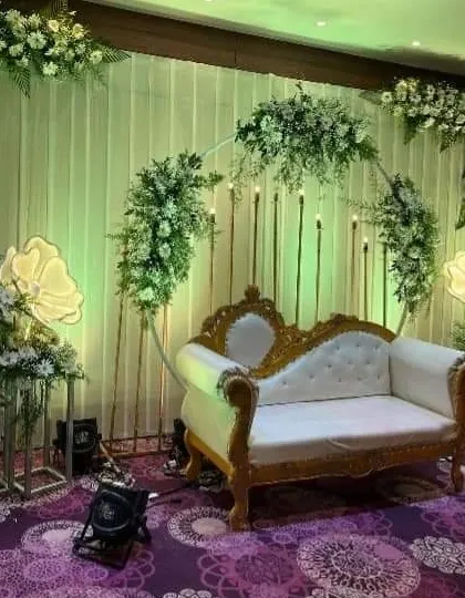 The same stage with green lighting, demonstrating how we can change the mood and color scheme with our lighting systems.