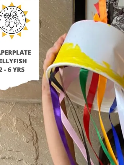 Look at this beautiful paper plate jellyfish! This craft combines painting and threading to create a whimsical sea creature, helping children develop fine motor skills while learning about marine animals.