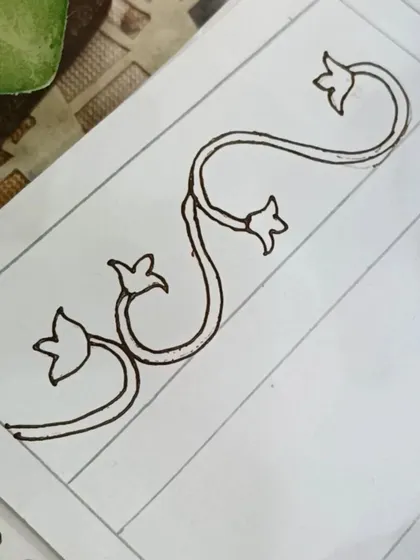The basic vine structure for the border. We start with this simple flowing line and build upon it.
