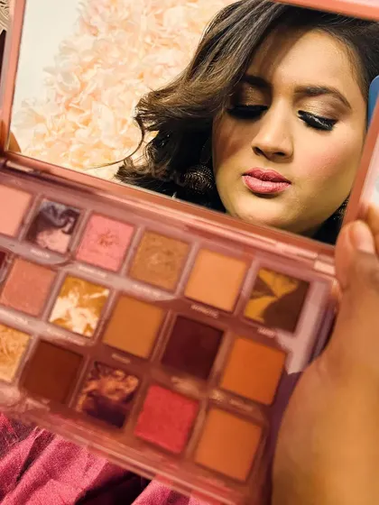 A creative shot showing the eyeshadow palette used to create this beautiful party look.
