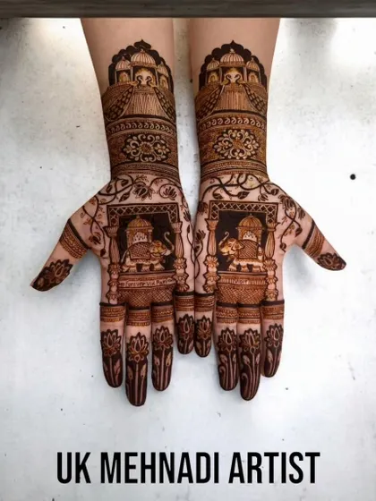 This design features majestic elephants inside ornate `jharokhas` (windows). It's a classic Rajasthani motif that gives a royal feel to the mehandi.